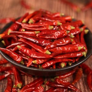 Mantianxing dried chili peppers in a black bowl