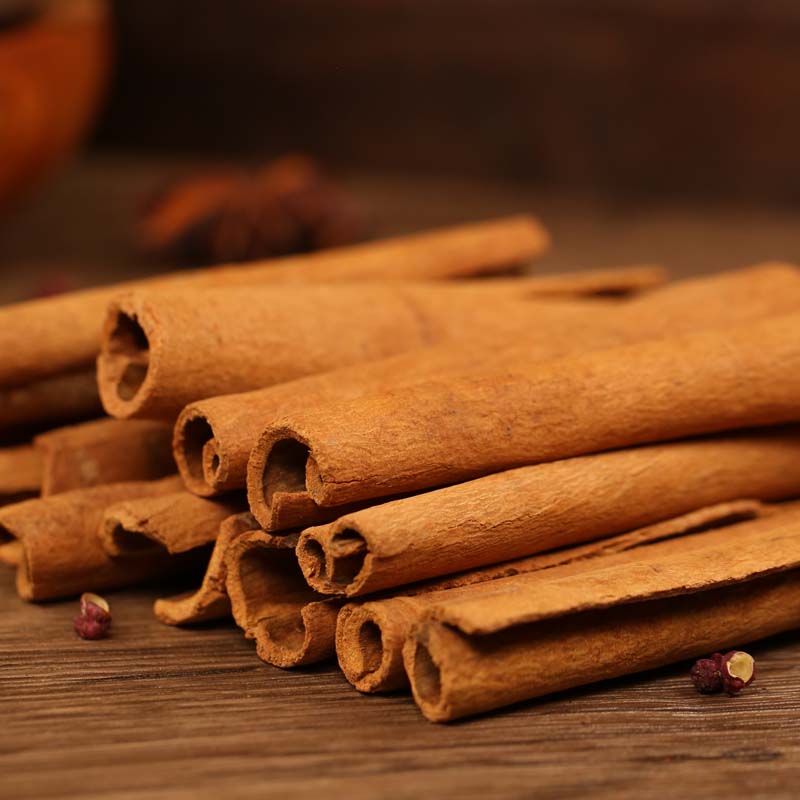 Cinnamon bark bundled on a wooden table
