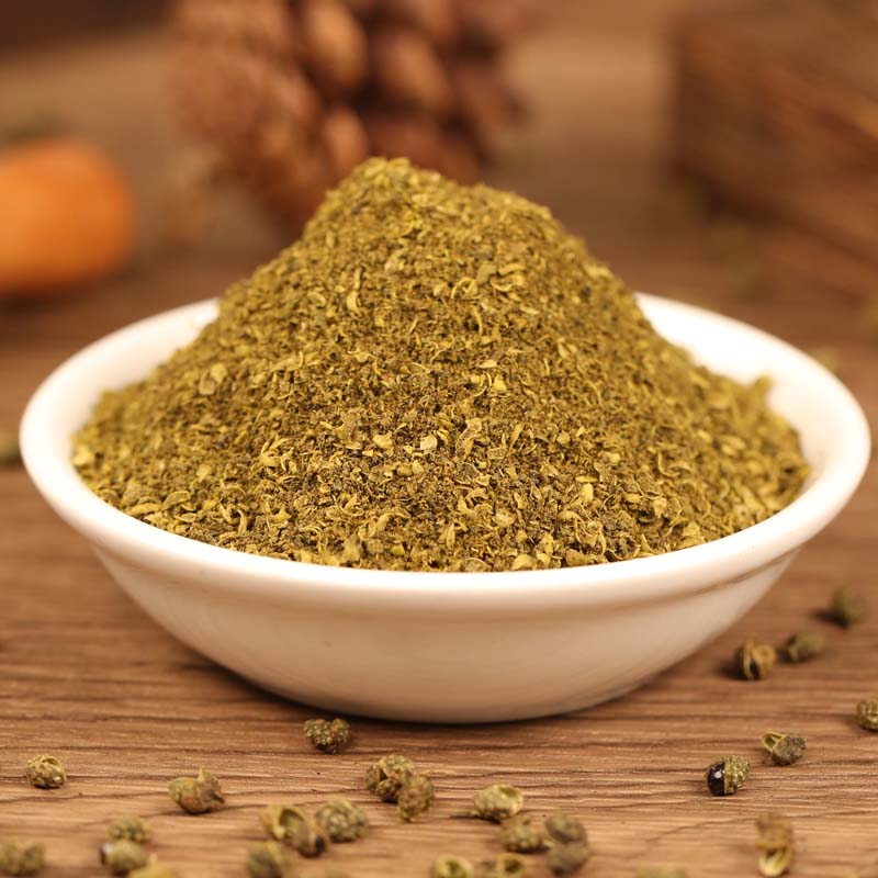 Green Sichuan pepper powder in a white bowl