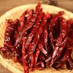 Erjingtiao dried chili peppers in a bamboo sieve