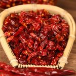 Erjingtiao dried chili segments in a bamboo basket