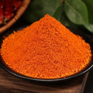 Mala chili dipping seasoning mounded on a black dish