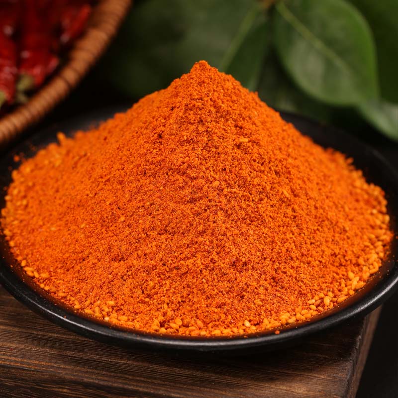 Mala chili dipping seasoning mounded on a black dish