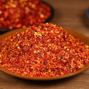 Five-variety ground chili blend on a brown plate