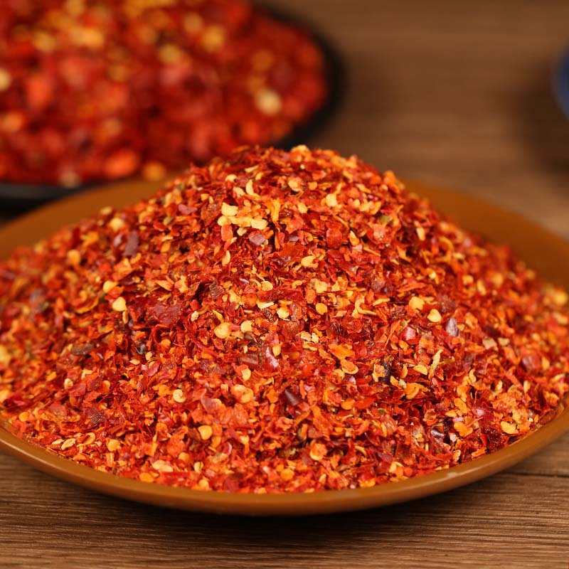 Five-variety ground chili blend on a brown plate