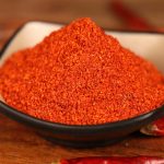 Xiaomila fine chili powder in a black bowl