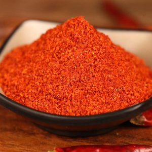Xiaomila fine chili powder in a black bowl