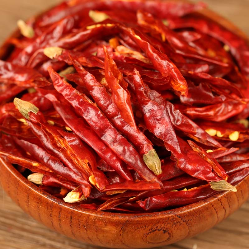Xiaomila chili threads in a wooden bowl