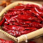 Xinyidai dried chili peppers in a bamboo basket