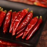 Mantianxing dried chili peppers on a black slate plate