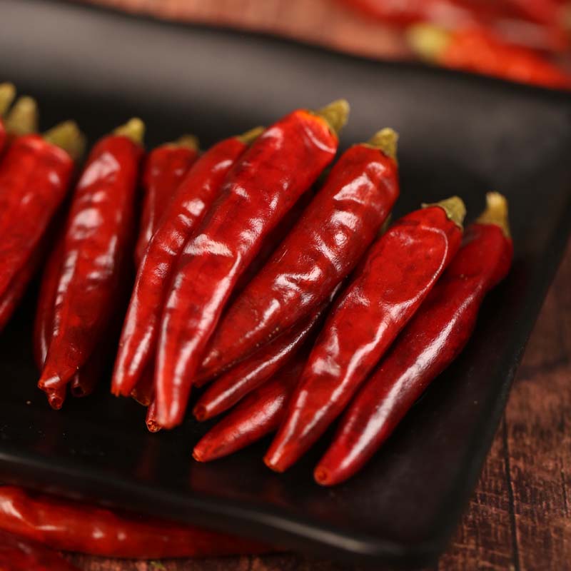 Mantianxing dried chili peppers on a black slate plate