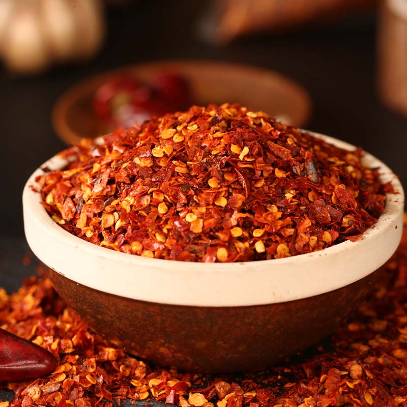Chili powder for chili oil in a white bowl