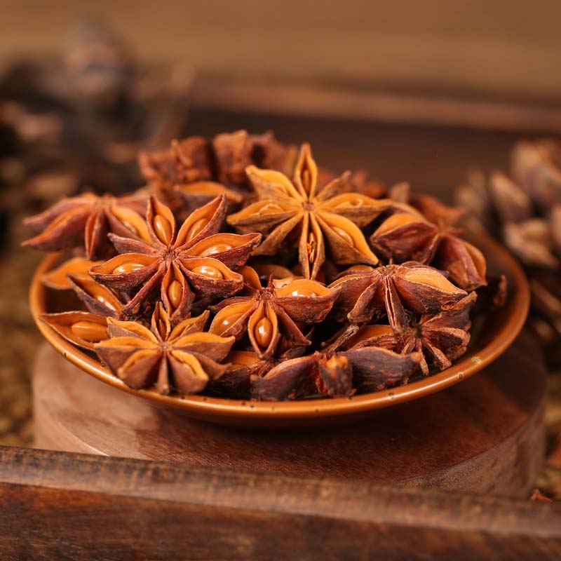 Star anise on a wooden plate