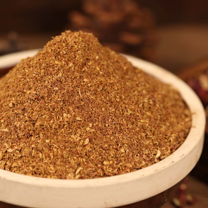Red Sichuan pepper powder mounded in a white bowl