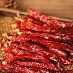 Erjingtiao dried chili peppers on a bamboo mat