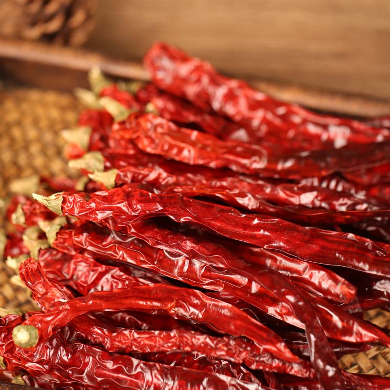 Erjingtiao dried chili peppers on a bamboo mat