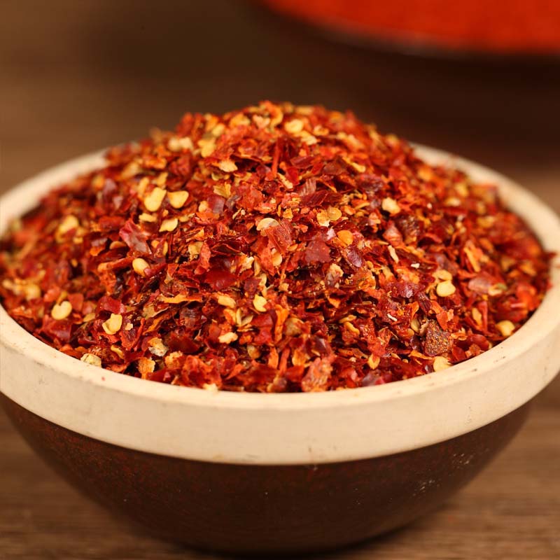Five-variety ground chili blend in a dark bowl