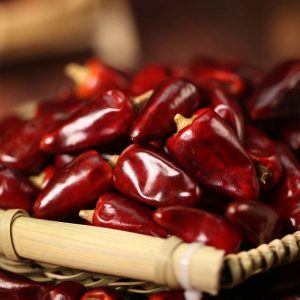 Zidantou dried chili peppers on a bamboo mat