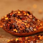 Roasted chili powder in a wooden bowl