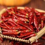 Mantianxing dried chili peppers on a bamboo tray