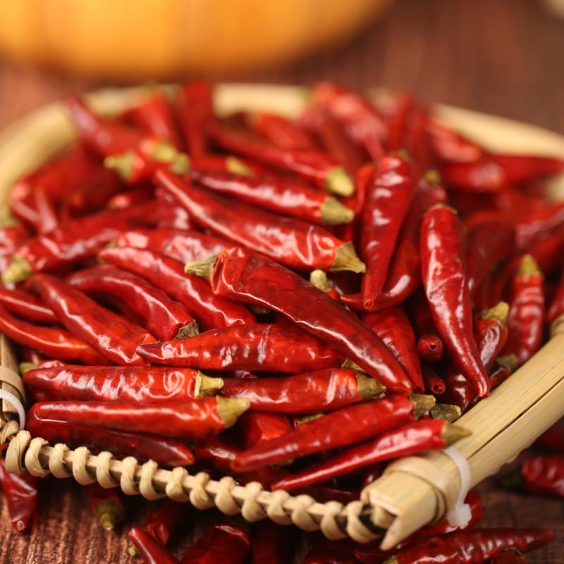 Mantianxing dried chili peppers on a bamboo tray
