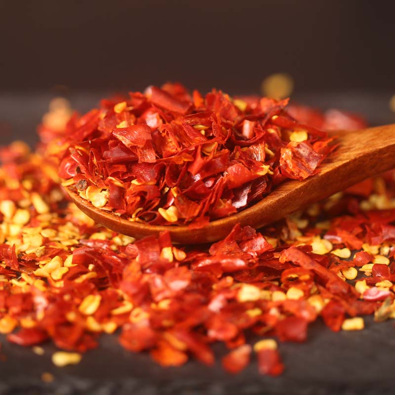 Erjingtiao coarse chili flakes on a wooden spoon