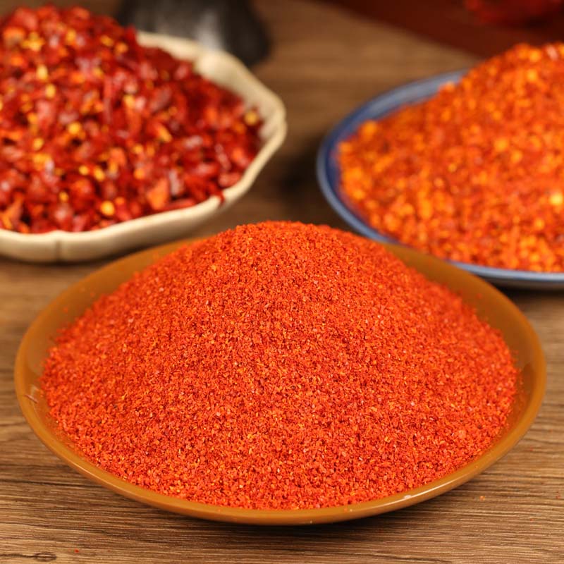 Three-variety ground chili blend on a brown plate