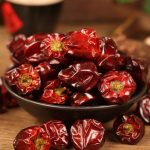 Denglongjiao dried chili peppers in a black bowl