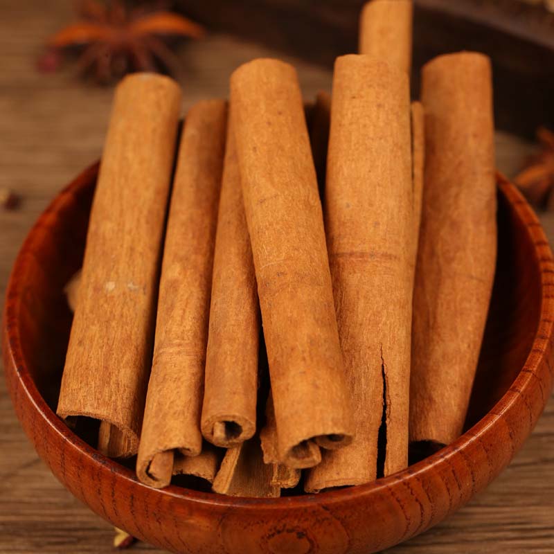 Cinnamon bark in a wooden bowl