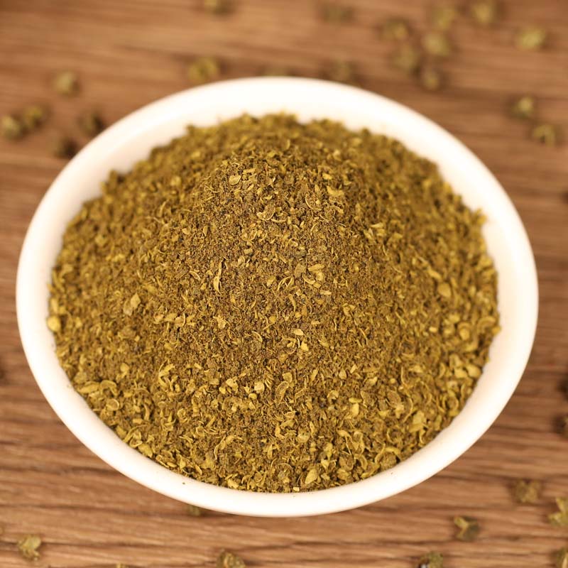 Green Sichuan pepper powder in a small white dish