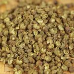 Green Sichuan peppercorns in close-up