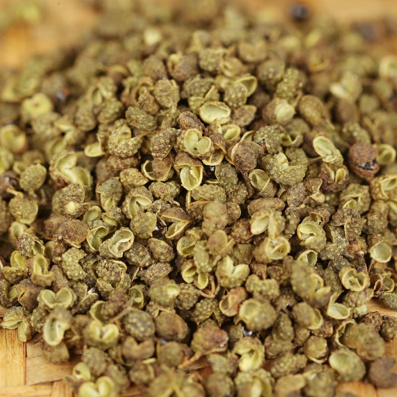 Green Sichuan peppercorns in close-up