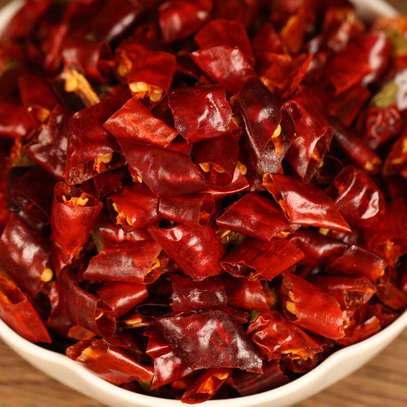 Mantianxing dried chili segments in a white bowl