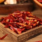 Tiaozi chili threads spread in a wooden tray