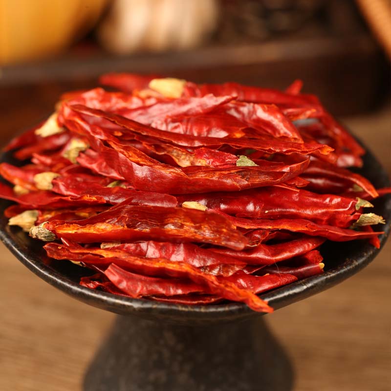 Xiaomila chili threads on a black stand