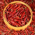 Mantianxing dried chili peppers in a round bamboo basket