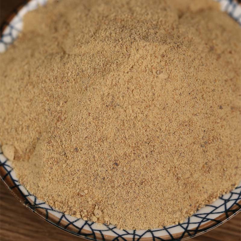 Ground white pepper in a patterned bowl