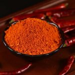 Mala chili dipping seasoning in a black dish