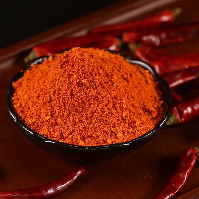 Mala chili dipping seasoning in a black dish