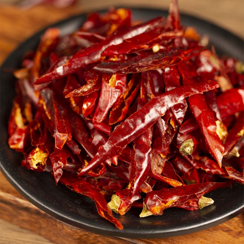 Tiaozi chili threads heaped on a dark plate