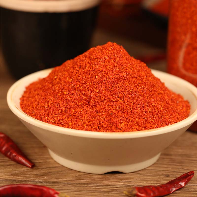 Xiaomila fine chili powder in a white bowl