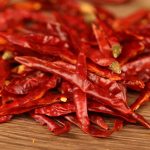 Xiaomila chili threads in close-up on a wooden table