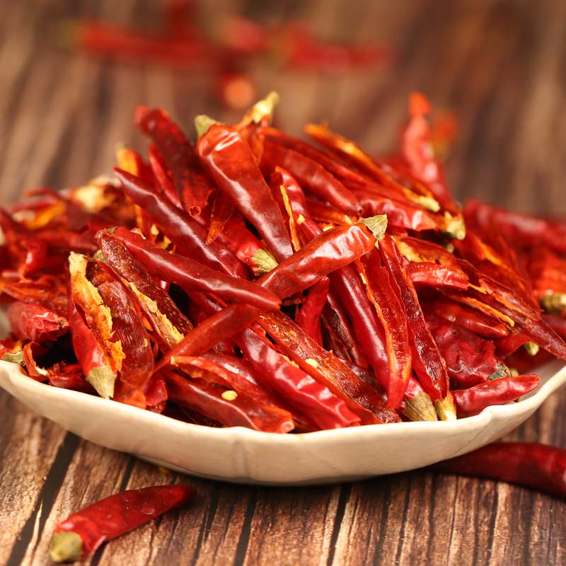 Huaxi chili threads on a white plate