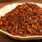 Roasted chili powder in a white dish